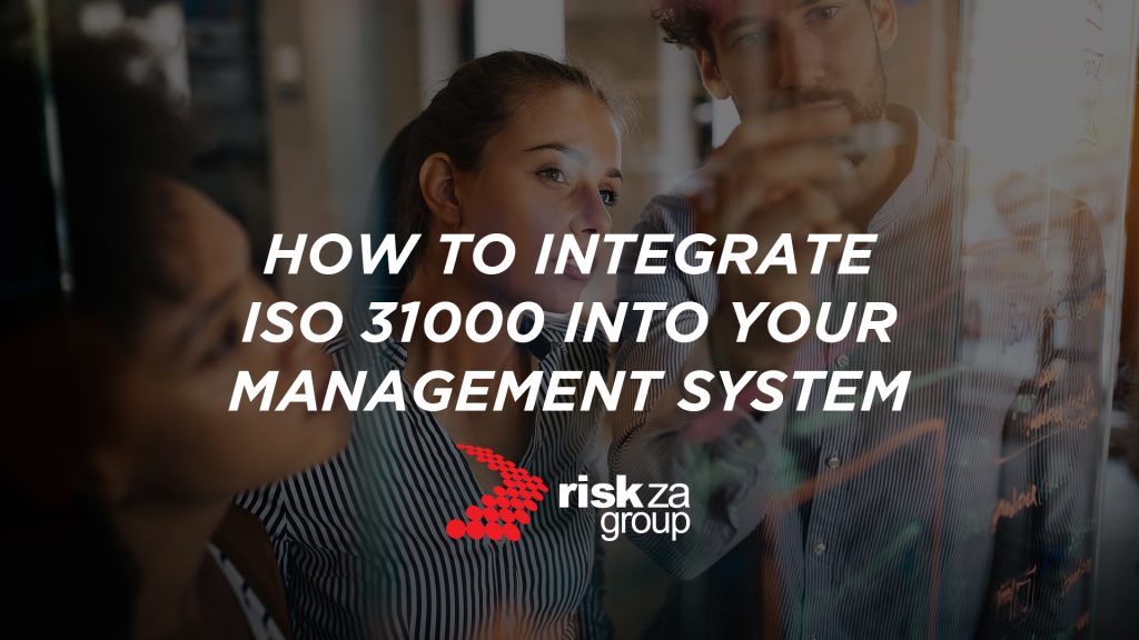 A banner image containing business people, who are analysing data. The banner contains the text: "How to Integrate ISO 31000 into your Management System", as well as the Risk ZA Group logo.